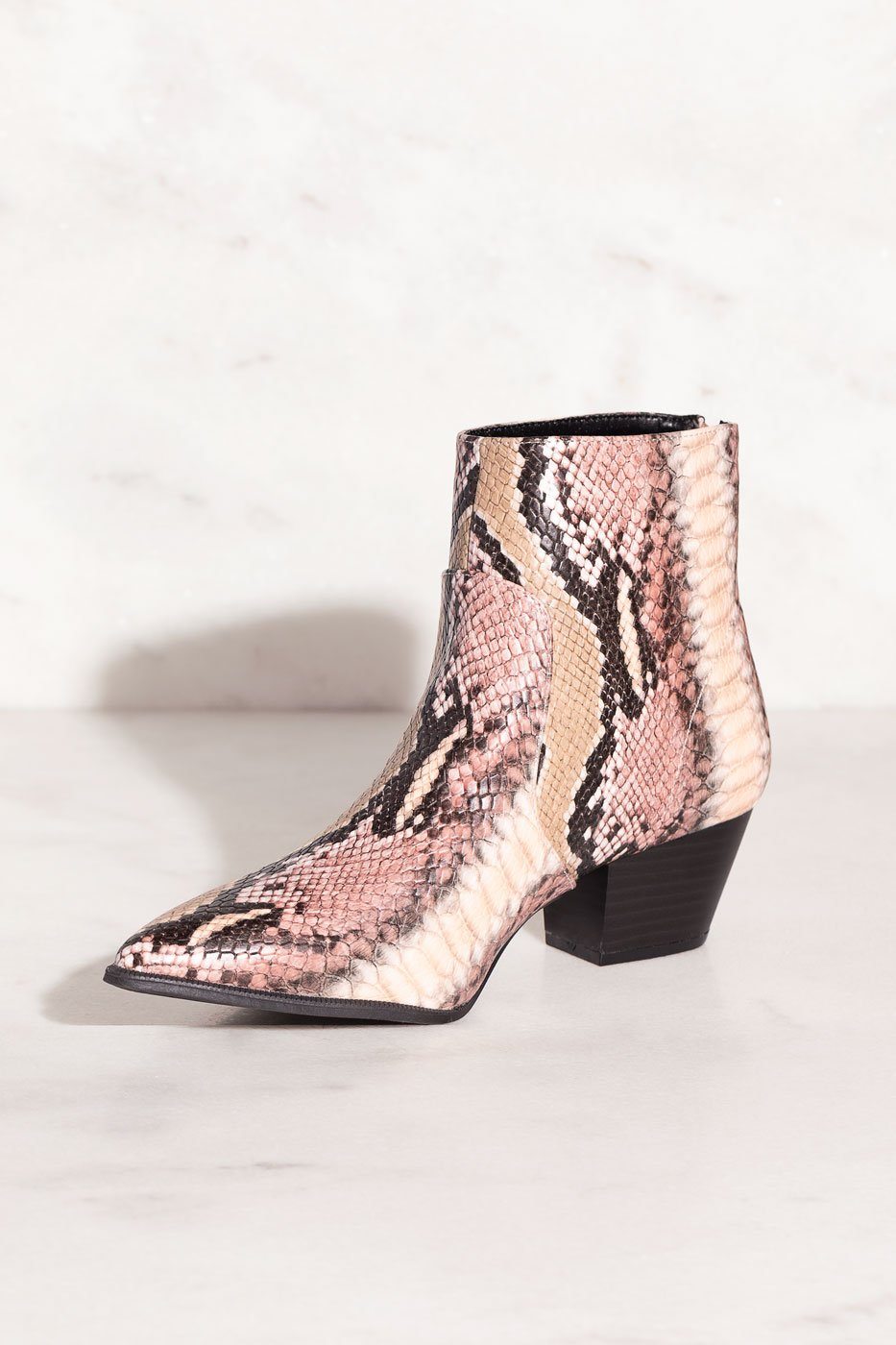 Pointed toe outlet snakeskin booties